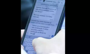 Rejeitada ação contra fotógrafo que flagrou conversa de WhatsApp de senador